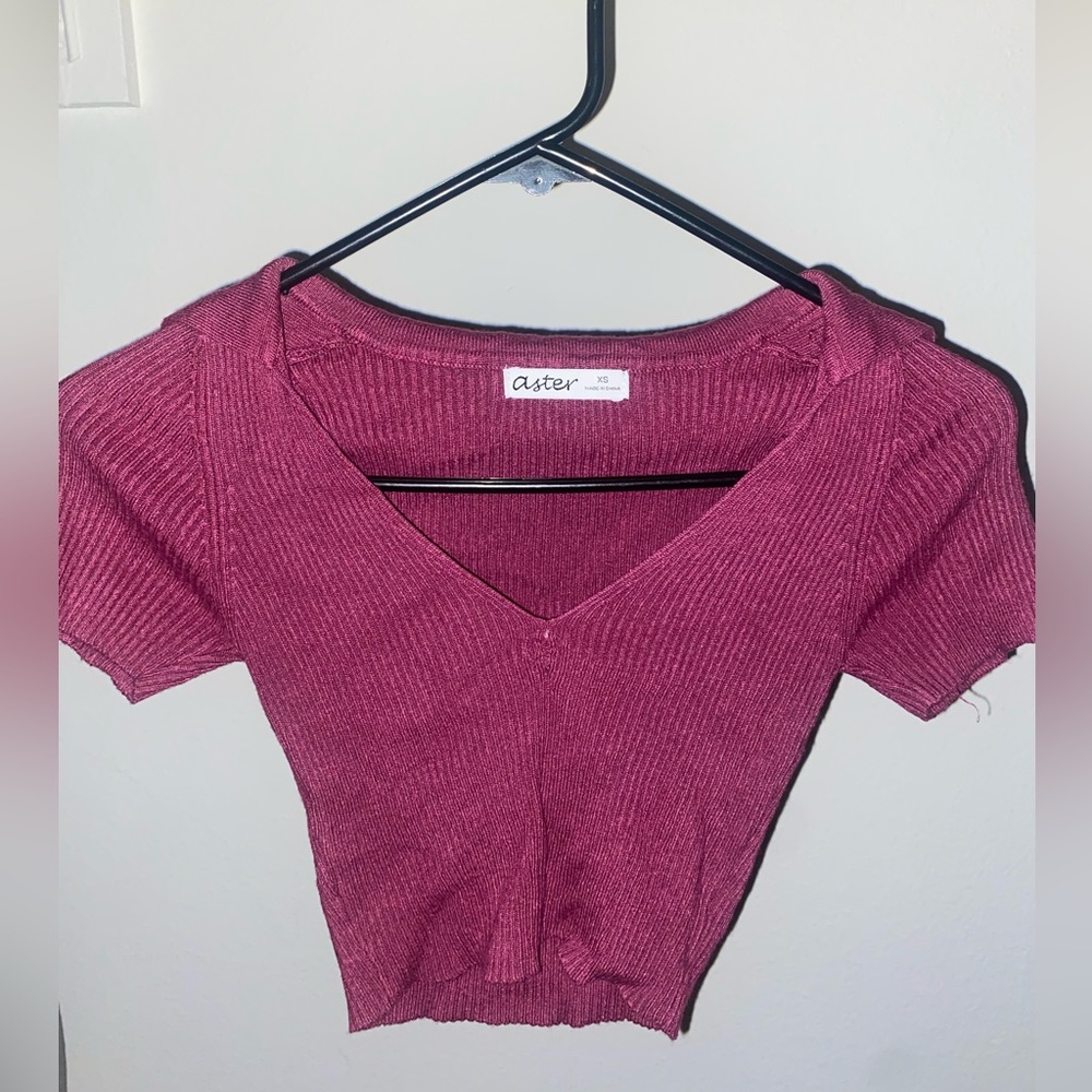 Red V neck short sleeve Aster top. Material is stretchy size XS